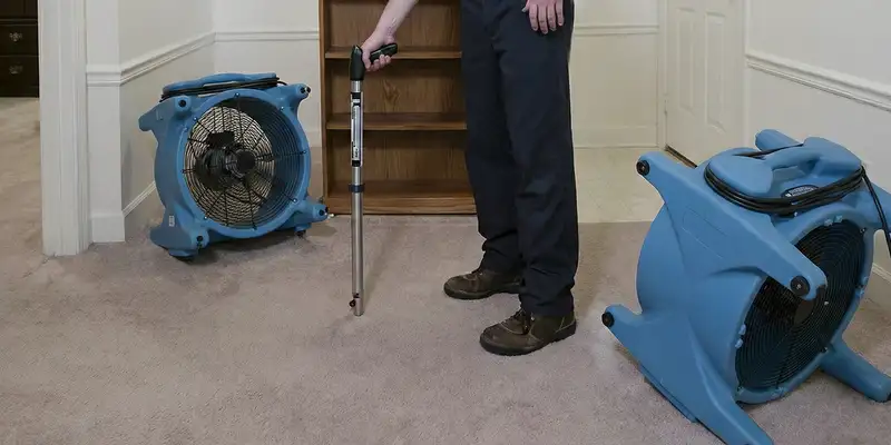 emergency water removal equipment deployed to dry a flooded residential interior in Tucson, AZ
